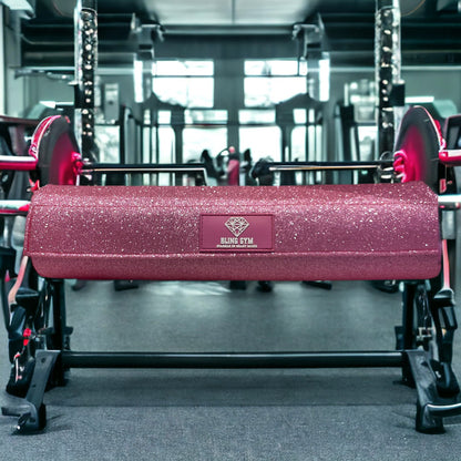 Gym Pink Glitter Barbell Pad - Thick Foam, velcro closure for secure heavy lifting.